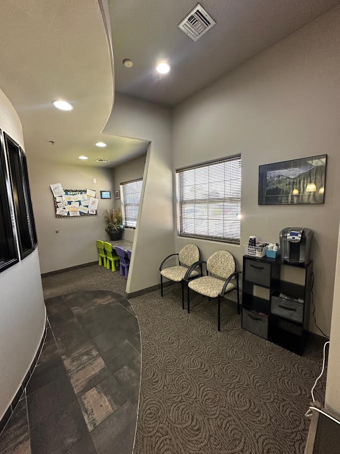 Kids' nook with toys and family-friendly seating